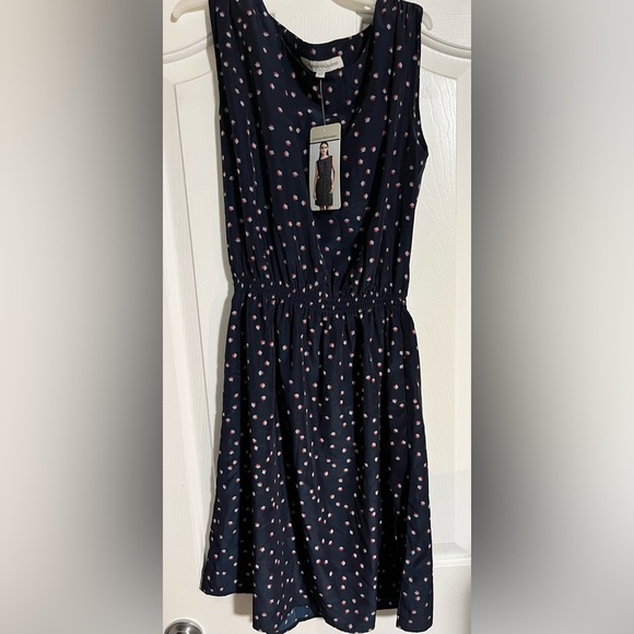 Navy Polka Dot Sleeveless Dress - Picture 1 of 3